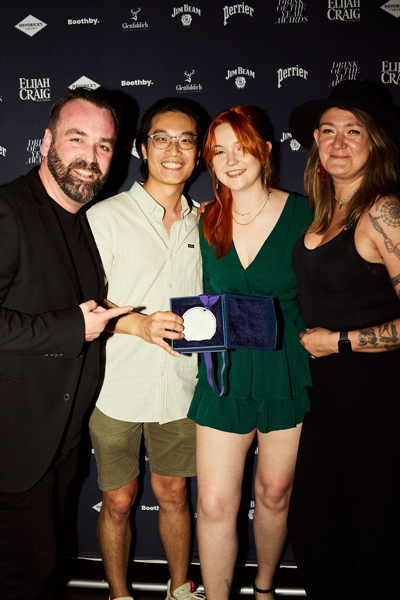 The PS40 crew pick up the medal on behalf of Michael Chiem and the Africola, winner of the 2024 Drink of the Year presented by Jim Beam. Photo: Tom Yau