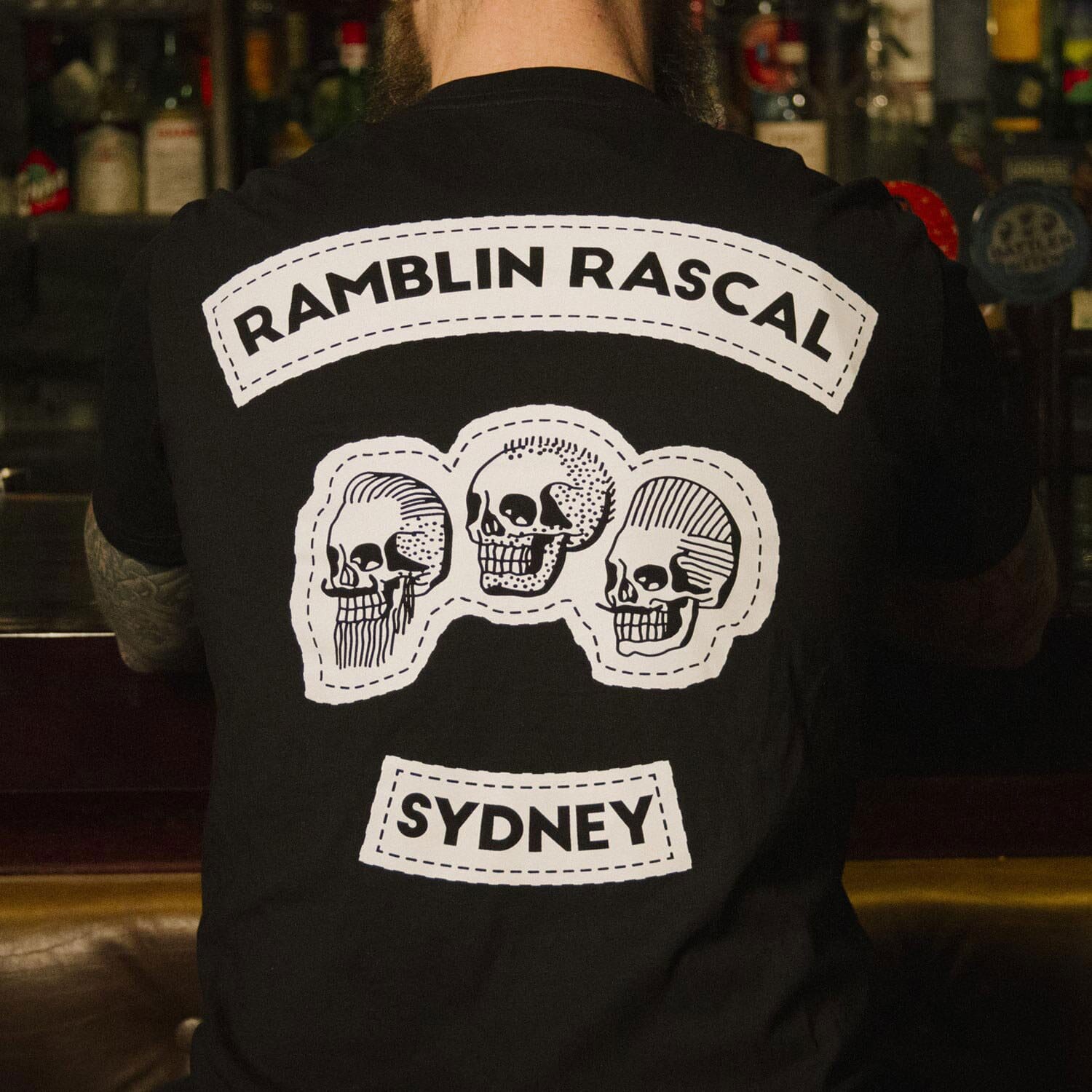 Ross doesn't step foot on a plane without at least one Rascal tee. Photo: Supplied