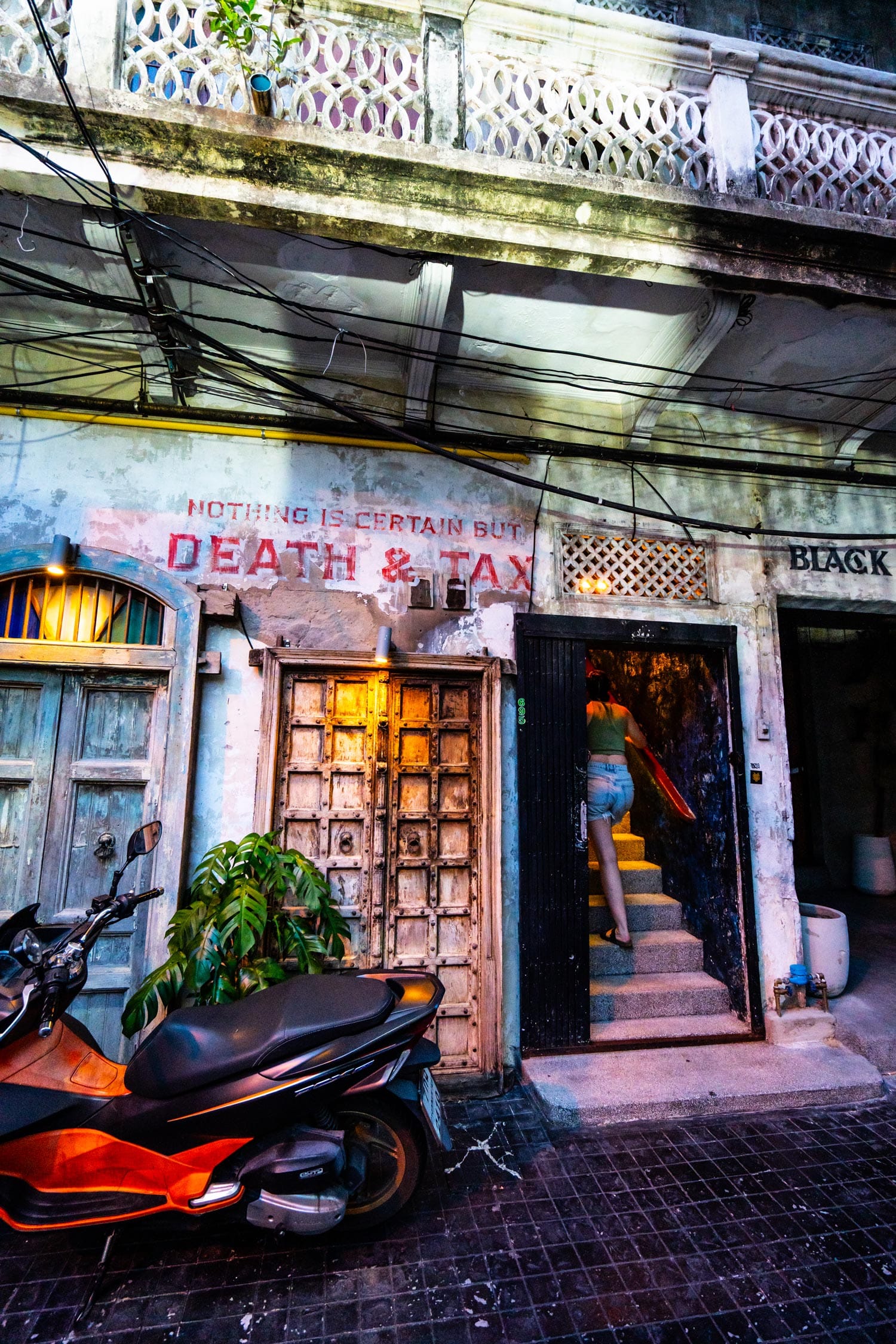 The entrance to TAX bar in Bangkok. Photo: Fred Siggins