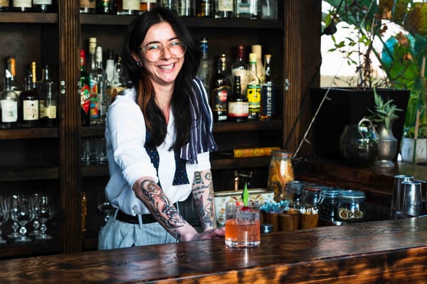 Sarah Mycock at Old Mate's Place with the Pandan Airways cocktail. Photo: Boothby